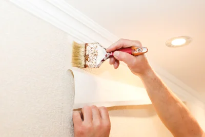 Pose de papier peint à Cassen — revêtements muraux et toiles de verre